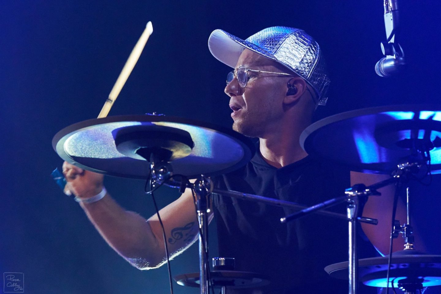 Furalines drummer playing live on stage